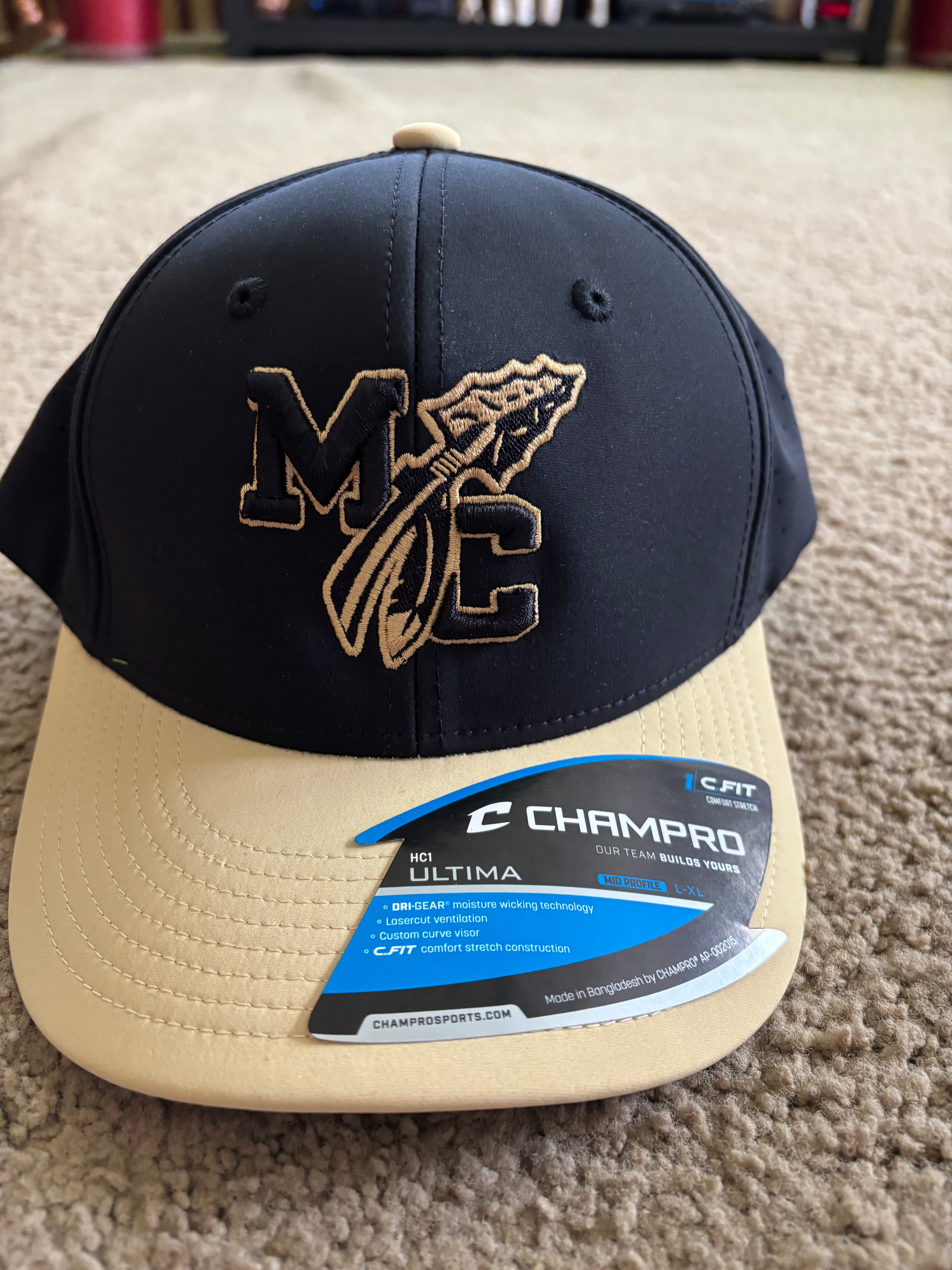 Monroe Central flex fit cap 2 tone black crown Vegas Gold Bill with Seminoles embroidered on back.